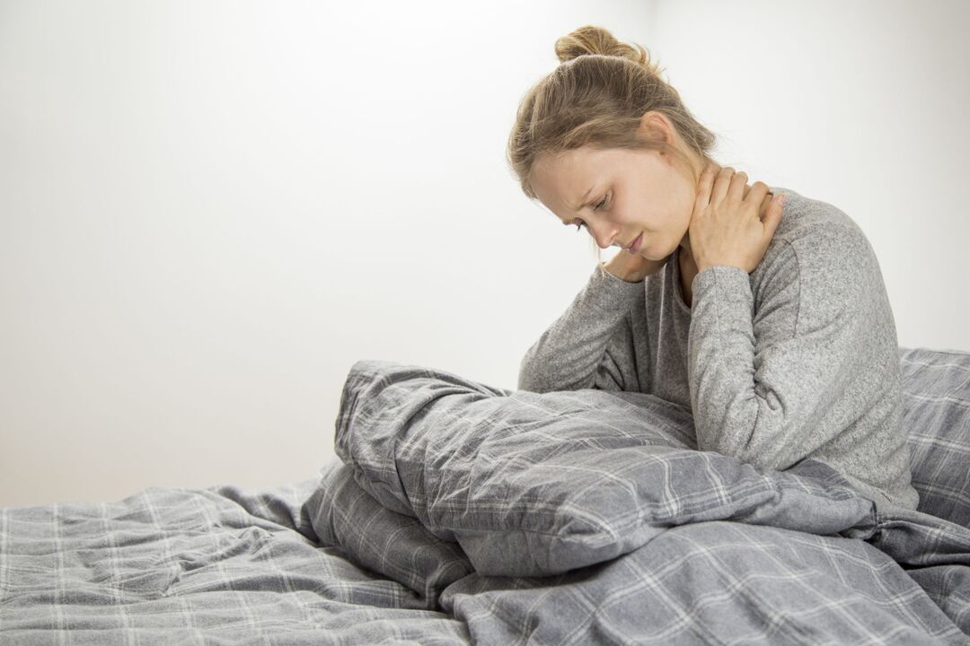 Woman with symptoms of cervical osteochondrosis
